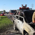 Man bends door to save driver from flaming vehicle